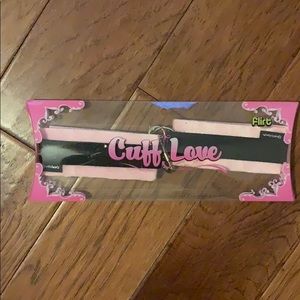 Pink cuffs. Brand new. Velcro straps.